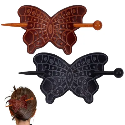 Imagen del producto de Dos pinzas para el pelo con forma de mariposa, hechas de cuero sintético