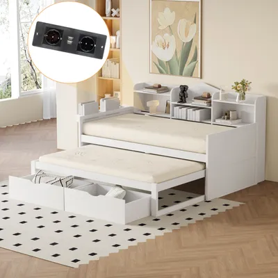 A white daybed with a pull-out trundle bed and storage drawers, set up in a room with a patterned rug and a painting on the wall.