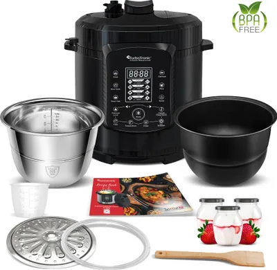 A black electric pressure cooker with various accessories, including stainless steel pots, a recipe book, and small jars with strawberries.