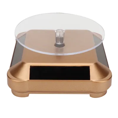 Obrázek produktu pro Otočný víceúčelový držák na hodinky, mobilní telefon, šperky a make-up se solárním napájením (zlatý)