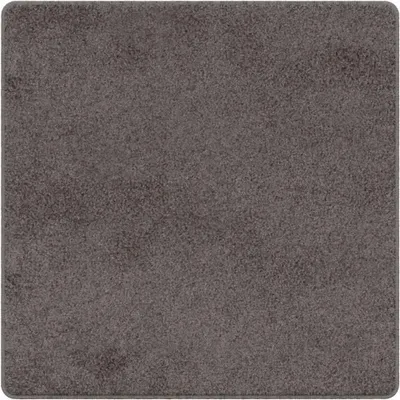 A close-up, top-down view of a square rug with a textured, grey surface.