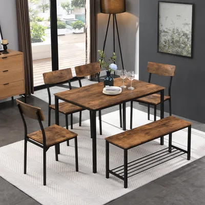 A dining set with a table, chairs, and a bench in a room.