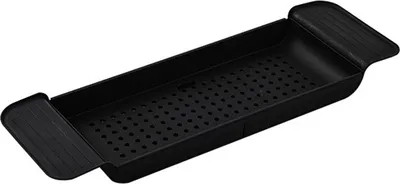 A black bath caddy with a perforated surface and extendable sides.