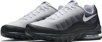 A pair of Nike Air Max Invigor sneakers shown from a diagonal angle against a white background.