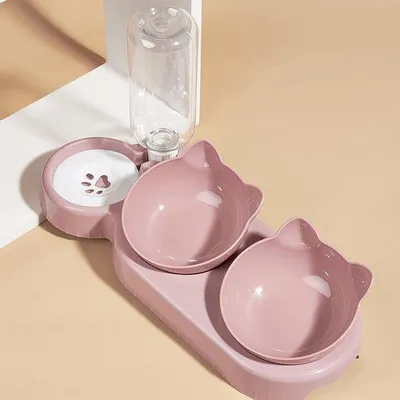 Produktbild von Katentränke- und Futterbaket 3-in-1, kippbares, für Katzen, mit Schwerkraftgefülltem Wasserschutzbeutel (rosa).