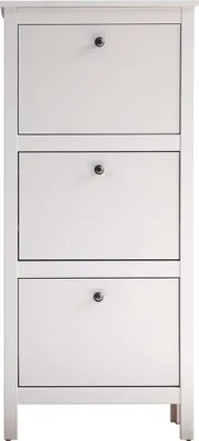 A white shoe cabinet with three flip-down doors.