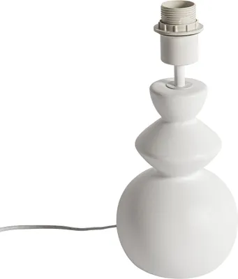 A white ceramic table lamp base with a cord, shown against a white background.