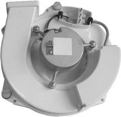A close-up, overhead view of a white centrifugal fan housing with a central motor.