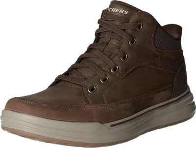 A brown mid-top sneaker with a tan sole.