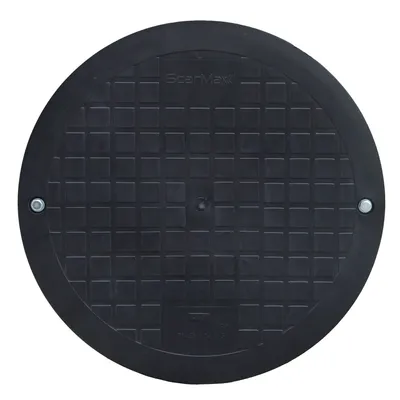 A black circular manhole cover with a grid pattern.