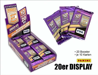 A display box of Panini FIFA trading card packs, with some loose packs shown next to it.