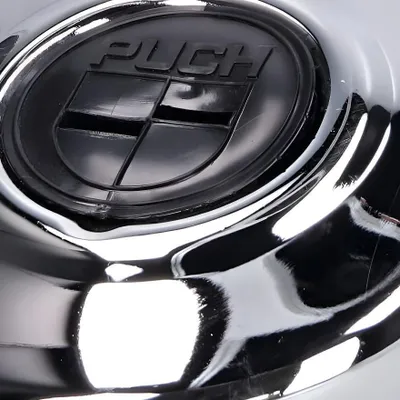 Produktbild von Lichtmaschinendeckel / Zündungsdeckel verchromt, schwarzes ' Puch-Logo ' für Puch Maxi X30
