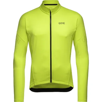 A bright yellow long-sleeved cycling jacket with a black zipper.
