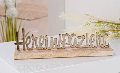 Produktbild von Gilde Schriftzug, "Hereinspaziert", Schriftzug, Aluminium, Mangoholz, goldfarben, naturfarben, VE 4, L. 6,5 cm, B. 30 cm, H. 9 cm Höhe: 9.00 cm Breite: 30.00 cm Tiefe: 6.50cm 55042