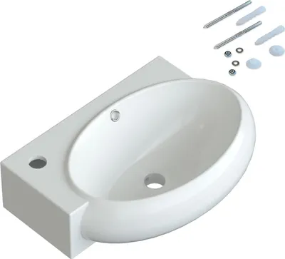 A white ceramic sink with mounting hardware.
