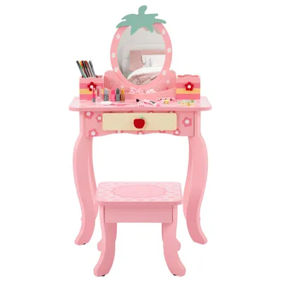 A pink children's vanity table and stool set with a strawberry-themed mirror and accessories.