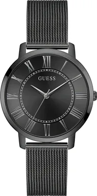 A close-up studio shot of a black GUESS watch with a mesh band and Roman numerals on the face.