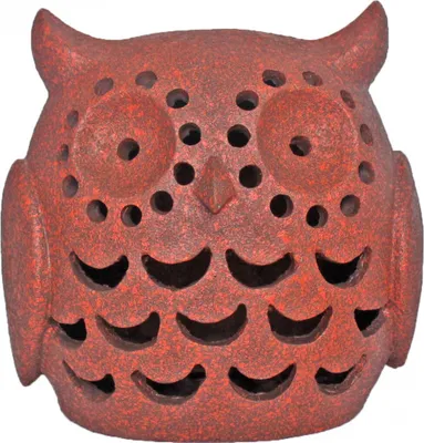A red-brown owl-shaped lantern with cutouts.