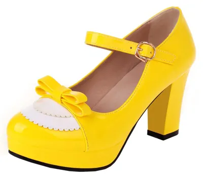 Productafbeelding van Damen pumps met blokhak en plateauzool, versierd met een strik