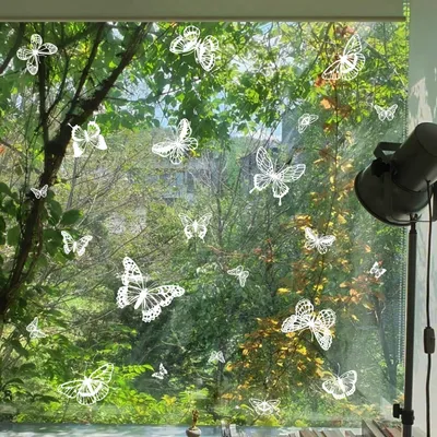 Produktbild von Wiederverwendbare Fensterbilder in Form von Schmetterlingen, selbstklebend in Weiß