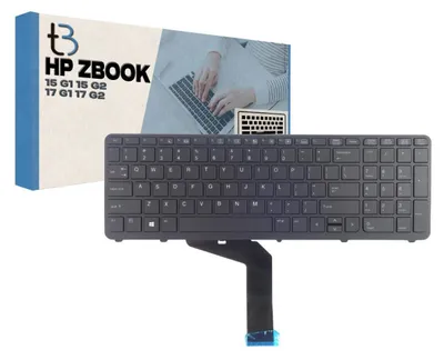 A laptop keyboard and its packaging are displayed against a white background.