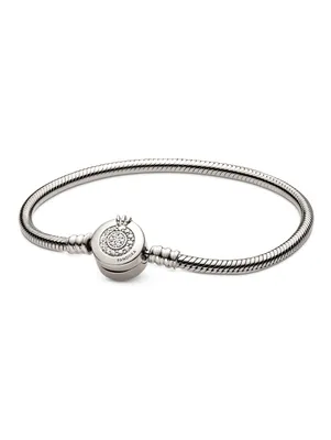 A close-up studio shot of a silver Pandora bracelet on a white background.