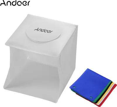 Zdjęcie produktu dla Andoer – przenośne studio fotograficzne z kasetą świetlną LED, namiot fotograficzny, mini składane studio fotograficzne z softboxem, 6 kolorowych teł, 2 paski LED z 40 diodami o temperaturze barwowej 6500 K, kabel USB – do fotografii biżuterii, drobnych przedmiotów i martwej natury