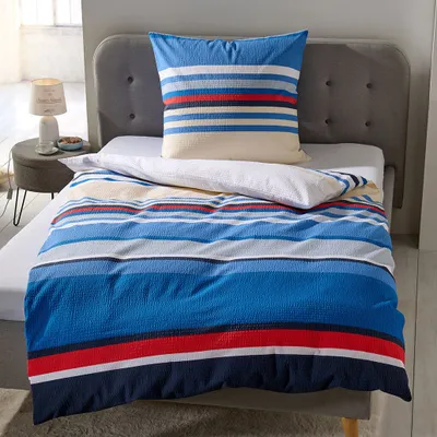 Produktbild von Traumschlaf Seersucker Bettwäsche Streifen blau 155x220 cm + 80x80 cm