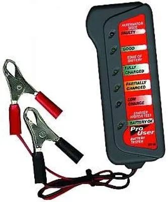 A car battery and alternator tester with attached jumper cables.