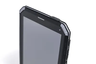 Close-up of the top corner of a rugged tablet.