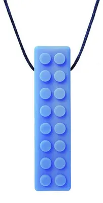 Image de Ark Therapeutics Kaukette : Jouet sensoriel en forme de brique pour enfants. Cette brique texturée, conçue pour être mordillée, offre une stimulation sensorielle riche pour les enfants et les adultes.
