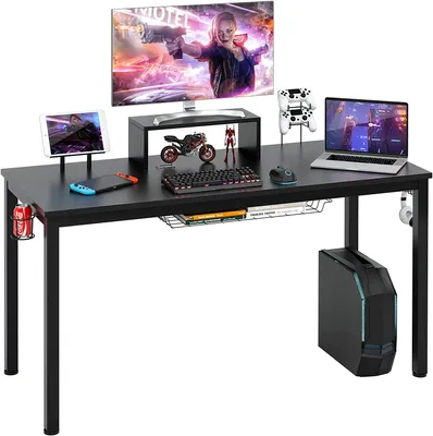 A gaming desk setup with a computer, monitor, keyboard, mouse, and accessories.