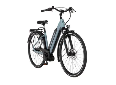 A light blue electric bicycle is shown against a white background.