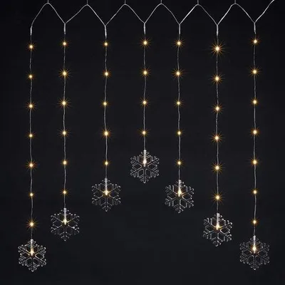 Zdjęcie produktu dla Śnieżynkowe girlandy LED, 120 x 70 cm - ciepła biel - 47 diod LED - dekoracja świąteczna, tworząca przytulną atmosferę