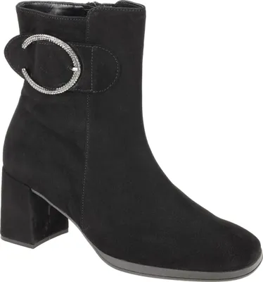 A black ankle boot with a decorative buckle.
