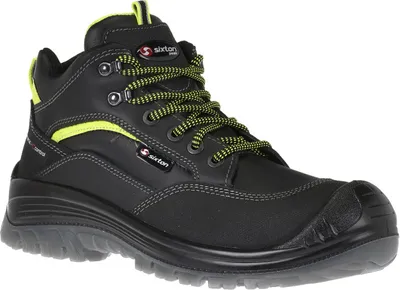 A single black and yellow work boot is shown against a white background.