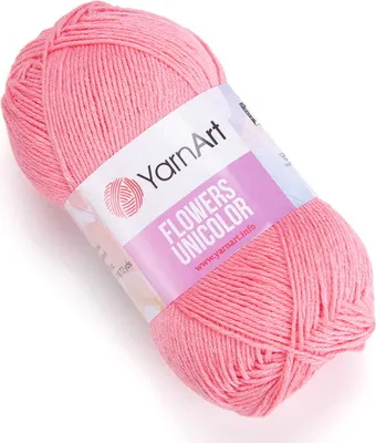A ball of pink yarn with a label.