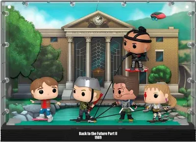 A diorama featuring Funko Pop! figures from Back to the Future Part II, set in front of the Hill Valley Courthouse.