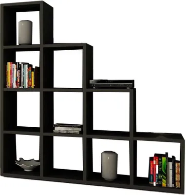 A modern, dark-colored tiered bookshelf with various items placed on its shelves.