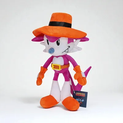 A plush toy of a character wearing a hat and gloves, standing against a white background.