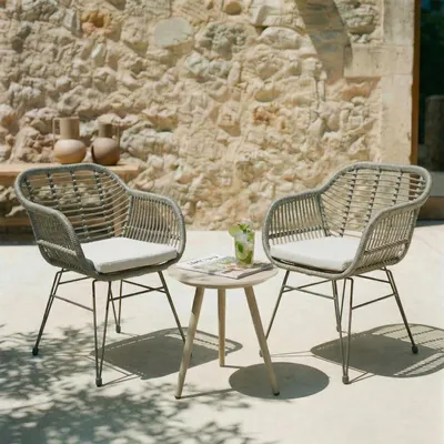 Produktbild von Gartenstuhl PARAMO im 2er Set, Grau/Champagner - Korbstuhl aus Polyrattan, Outdoor Stuhl mit gemütlichem Sitzkissen, moderner Esszimmerstuhl