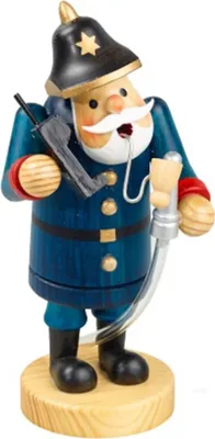 Räuchermännchen Feuerwehrmann mit Funkgerät und Pfeife. Er trägt eine dunkelblaue Uniform.
