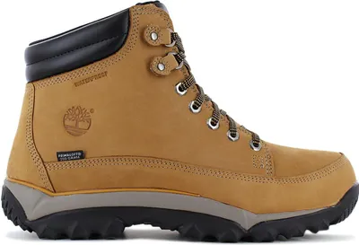 A side view of a tan Timberland boot on a white background.