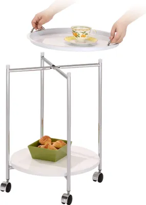 A serving cart with a tray and a bowl of pastries.