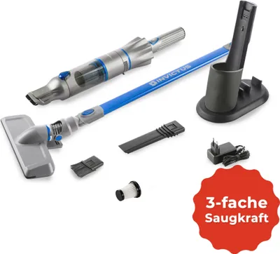 A collection of vacuum cleaner parts and accessories laid out on a white background.