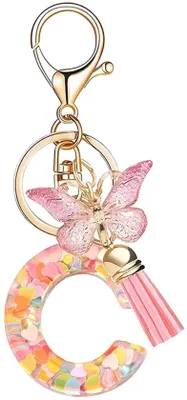Produktbild von Rosa Schmetterlings-Schlüsselanhänger mit Quasten für Damen