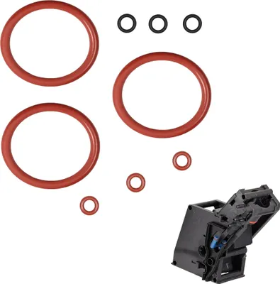 A set of red and black O-rings and a black coffee machine brewing unit on a white background.