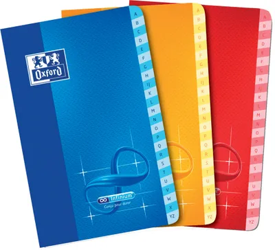 Three colorful Oxford notebooks with alphabetical dividers.