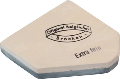 A sharpening stone with text printed on it.
