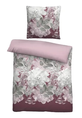 A bedding set, including a pillowcase and a duvet cover, displayed flat against a white background.